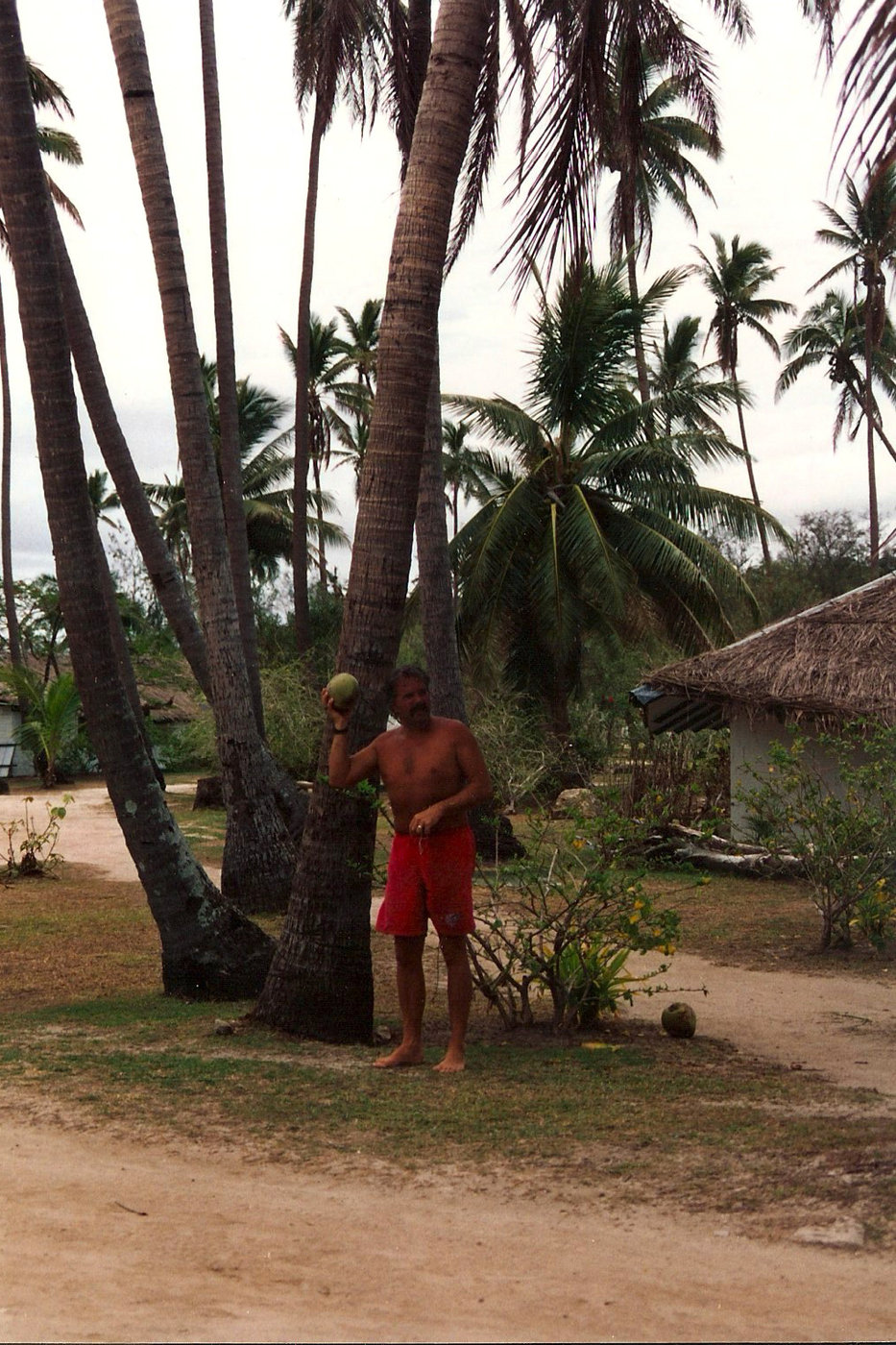 My dad with a coconut.